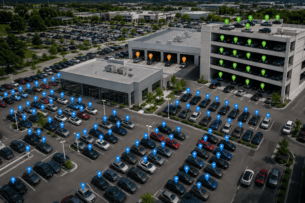 Aerial view of a dealership lot with every vehicle pinpointed