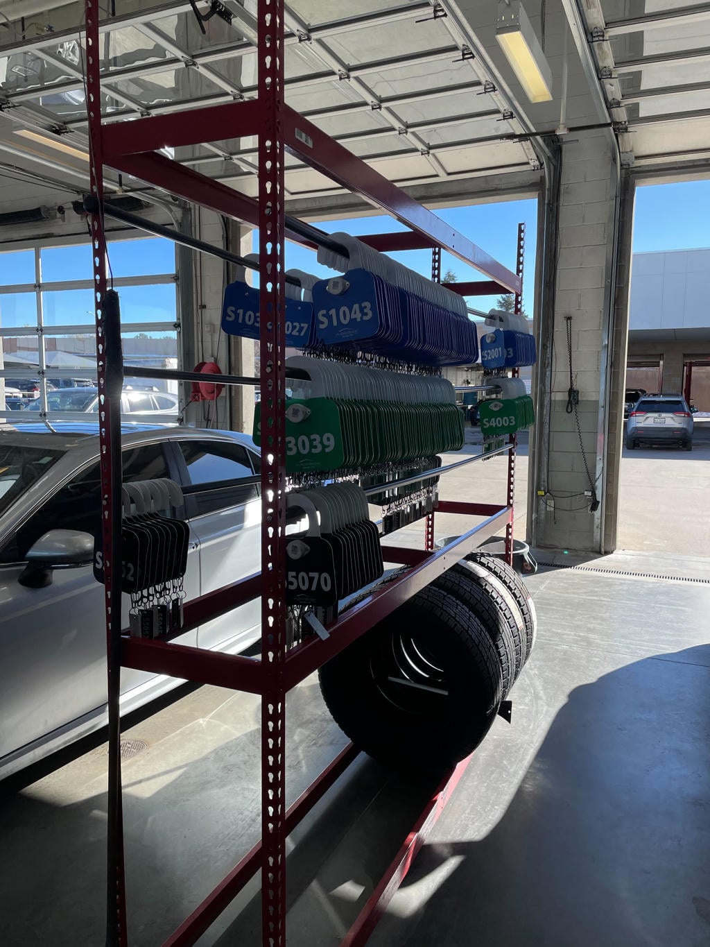 MDD placards hung on a tire-storage rack