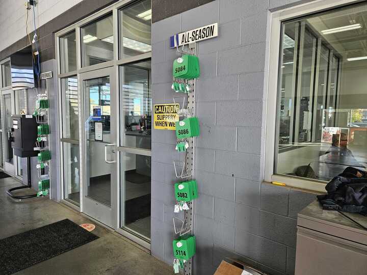 MDD placards organized on a service-drive wall rack